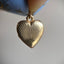 Sunburst Motif Heart Locket