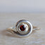 Silver spiral ring with garnet