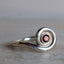 Silver spiral ring with garnet