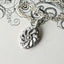 Silver Rosette Pendant